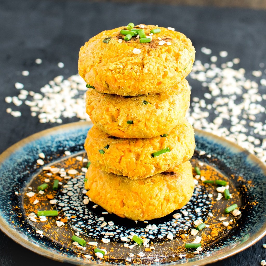 A plate stacked with Carrot Oatmeal Breakfast Patties 
