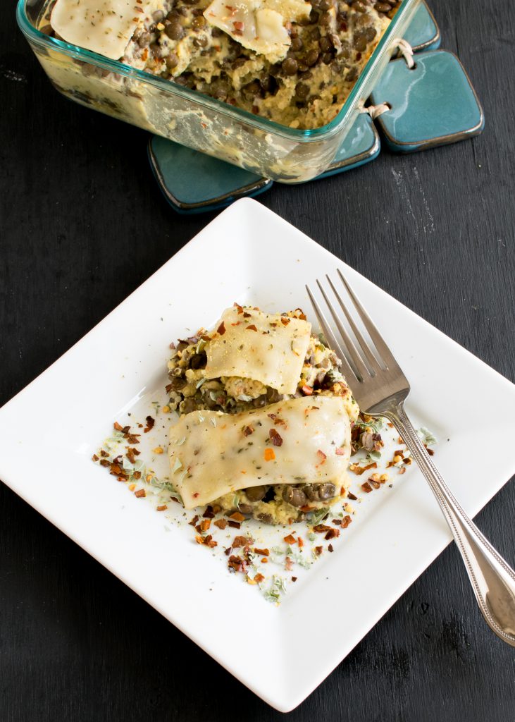 Top view of Cheesy Lentil Quinoa Vegan Casserole on a serving plate