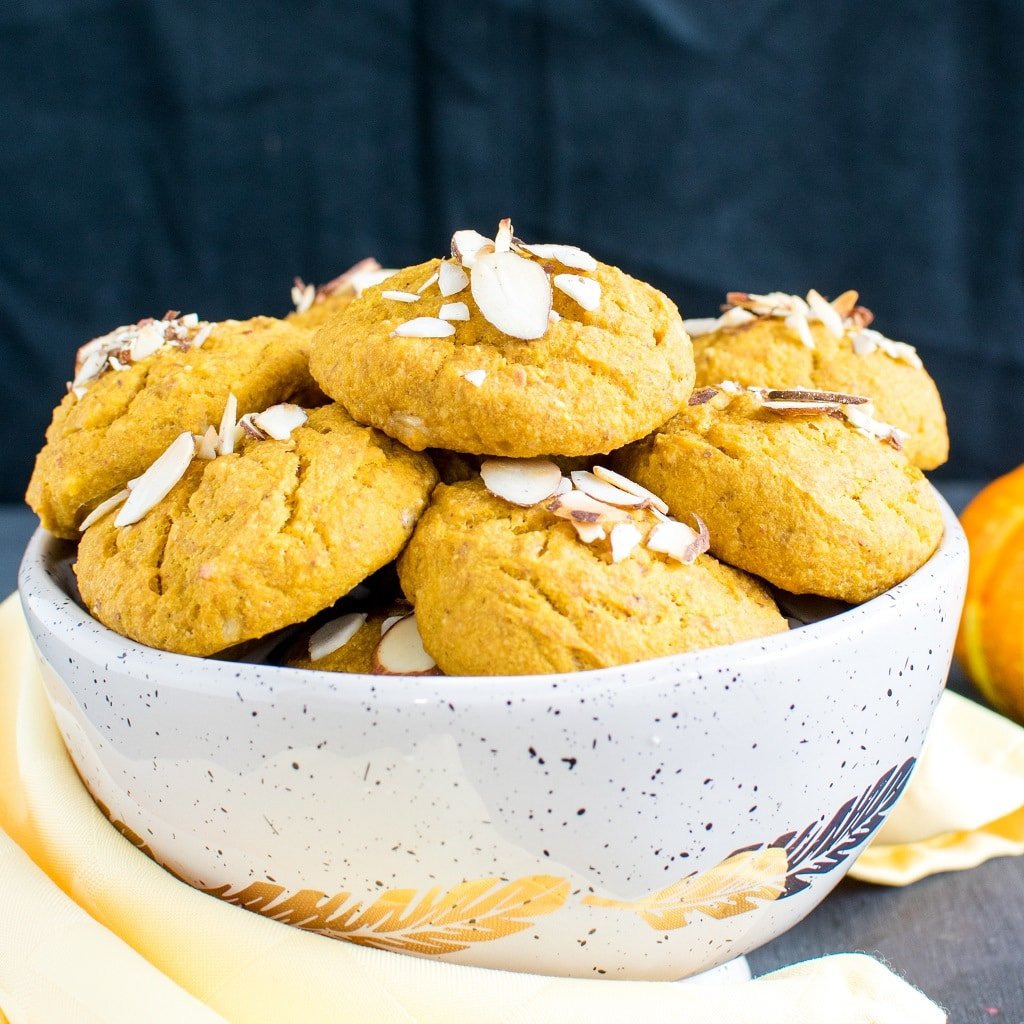 A bowl stacked with Almond Butter Pumpkin Oatmeal Cookies
