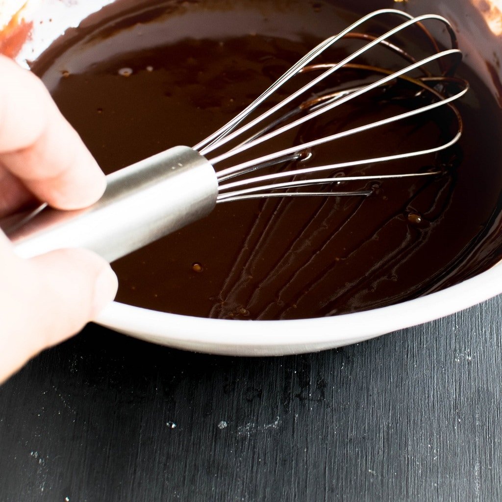 Chocolate Orange Ganache in the process of whisking is shown in this image | kiipfit.com 