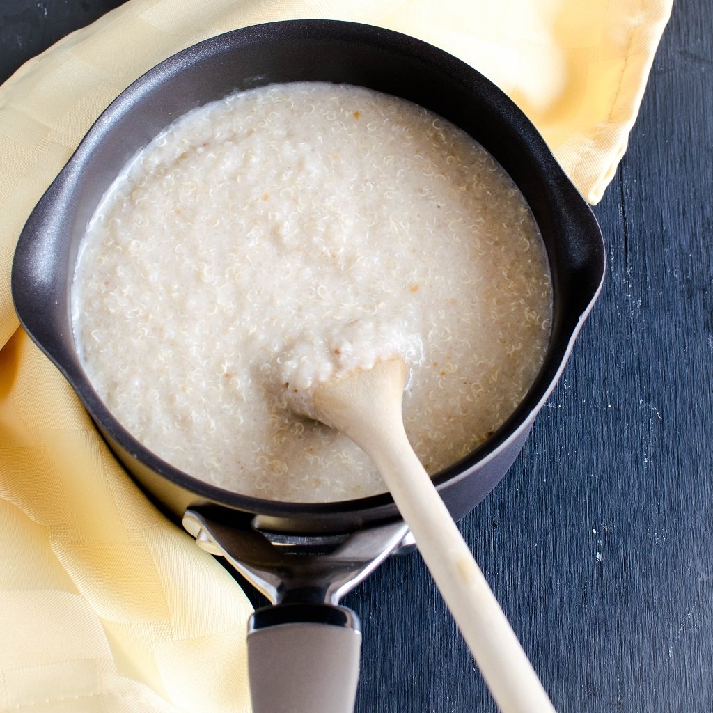 The cooked peanut butter quinoa flake porridge in the pan before serving is shown in this image | kiipfit.com
