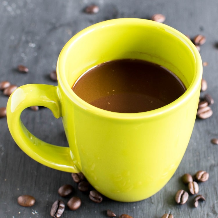 Fresh brewed coffee in a mug is shown in this image