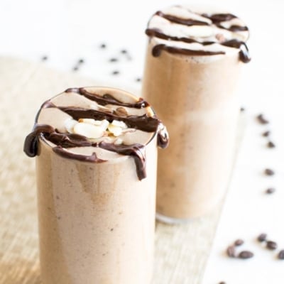 A close view of chocolate mocha protein smoothie in an angle is shown in this image