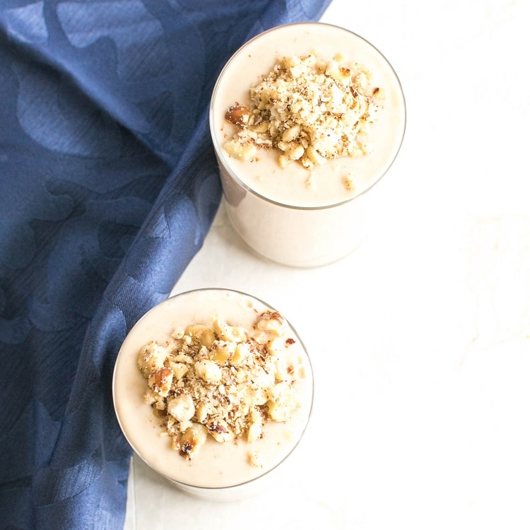 A top view of Hazelnut Cheesecake Smoothie in the serving glasses
