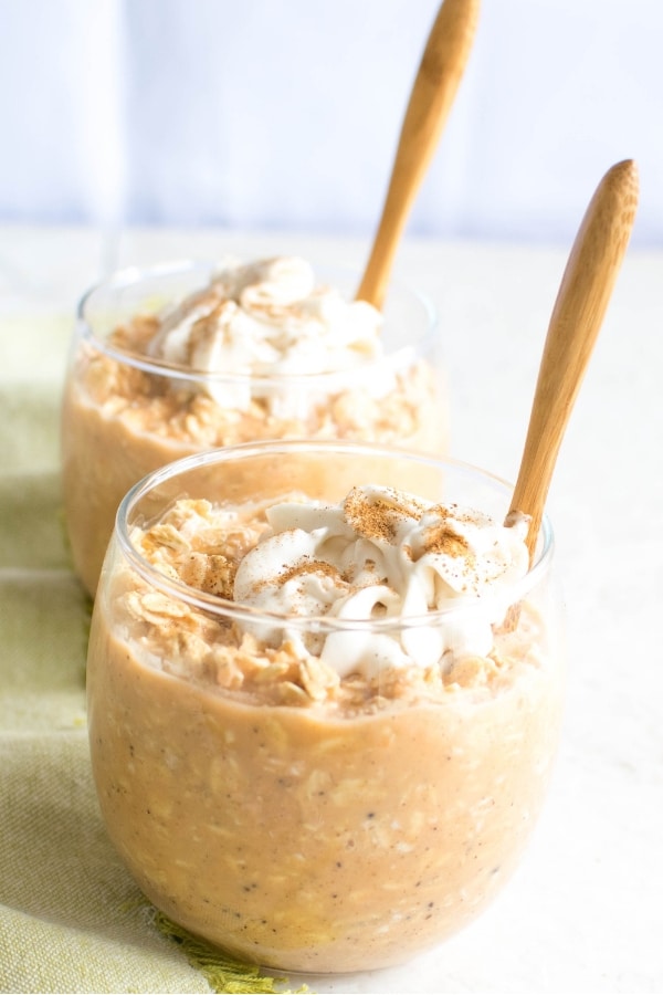 a front view of jars filled with carrot cake overnight oats.