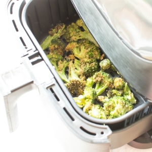 Top view of crispy broccoli in the air fryer