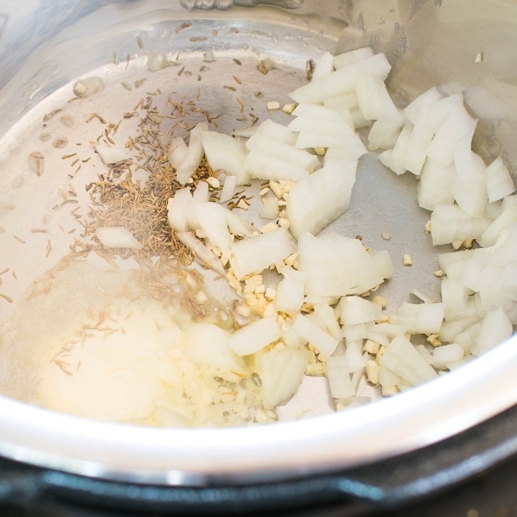Melted butter with onions and herbs in instant pot