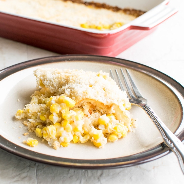 A portion of creamed corn casserole on a serving plate