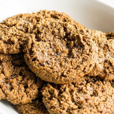 A bowl loaded with almond flour vegan ginger cookies