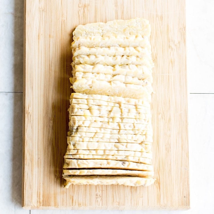 sliced tempeh on a wooden board