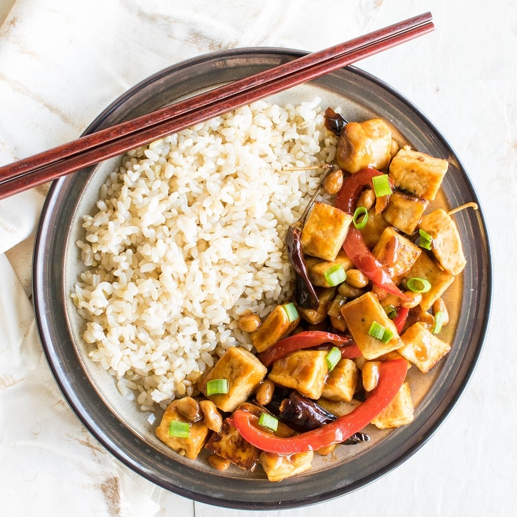 Top view of Kung Pao Tofu served with brown rice