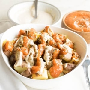 A front view of Patatas Bravas in a serving bowl