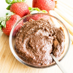 vegan nutella in a serving bowl with berries
