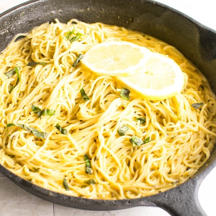 Garnished lemon pasta in a skillet