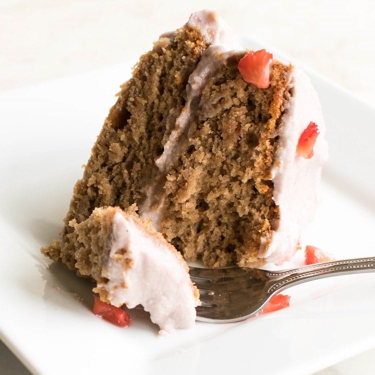 A close up view of a slice of vegan strawberry cake (oil free)