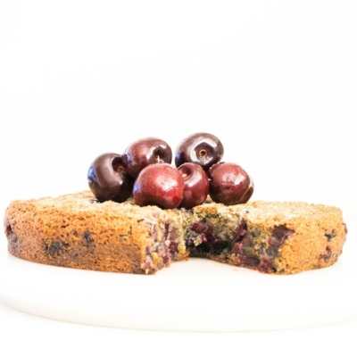 Full view of half eaten oil free cherry cake recipe