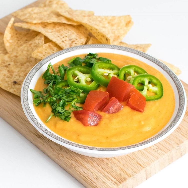 A 45 degree angle view of vegan queso cauliflower dip