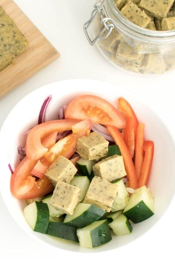 Top view of vegan feta cheese with chickpea flour