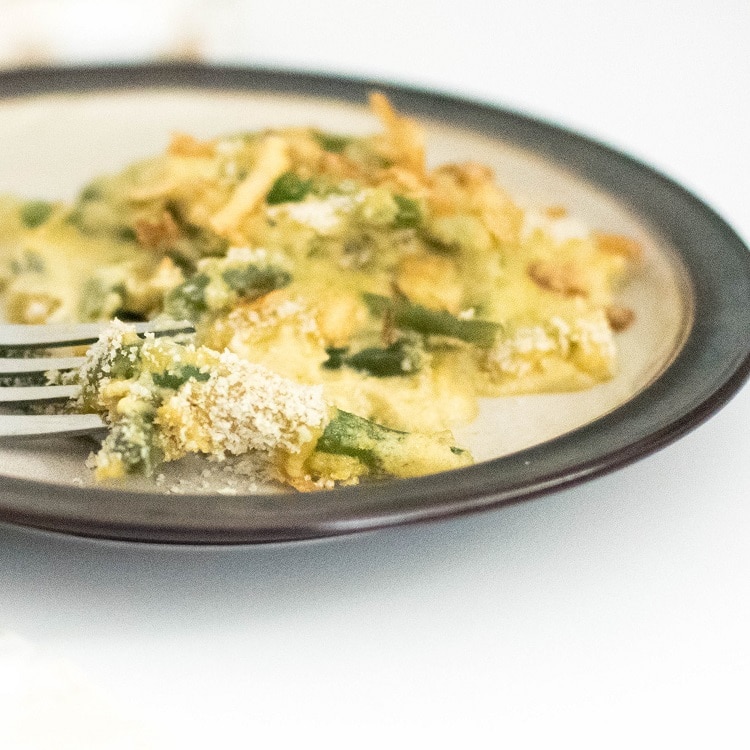 A fork picking up vegan green bean casserole recipe