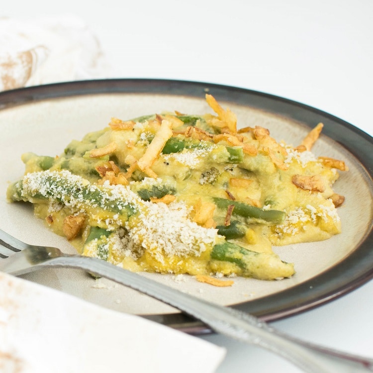 A close up view of vegan green bean casserole recipe on a serving plate