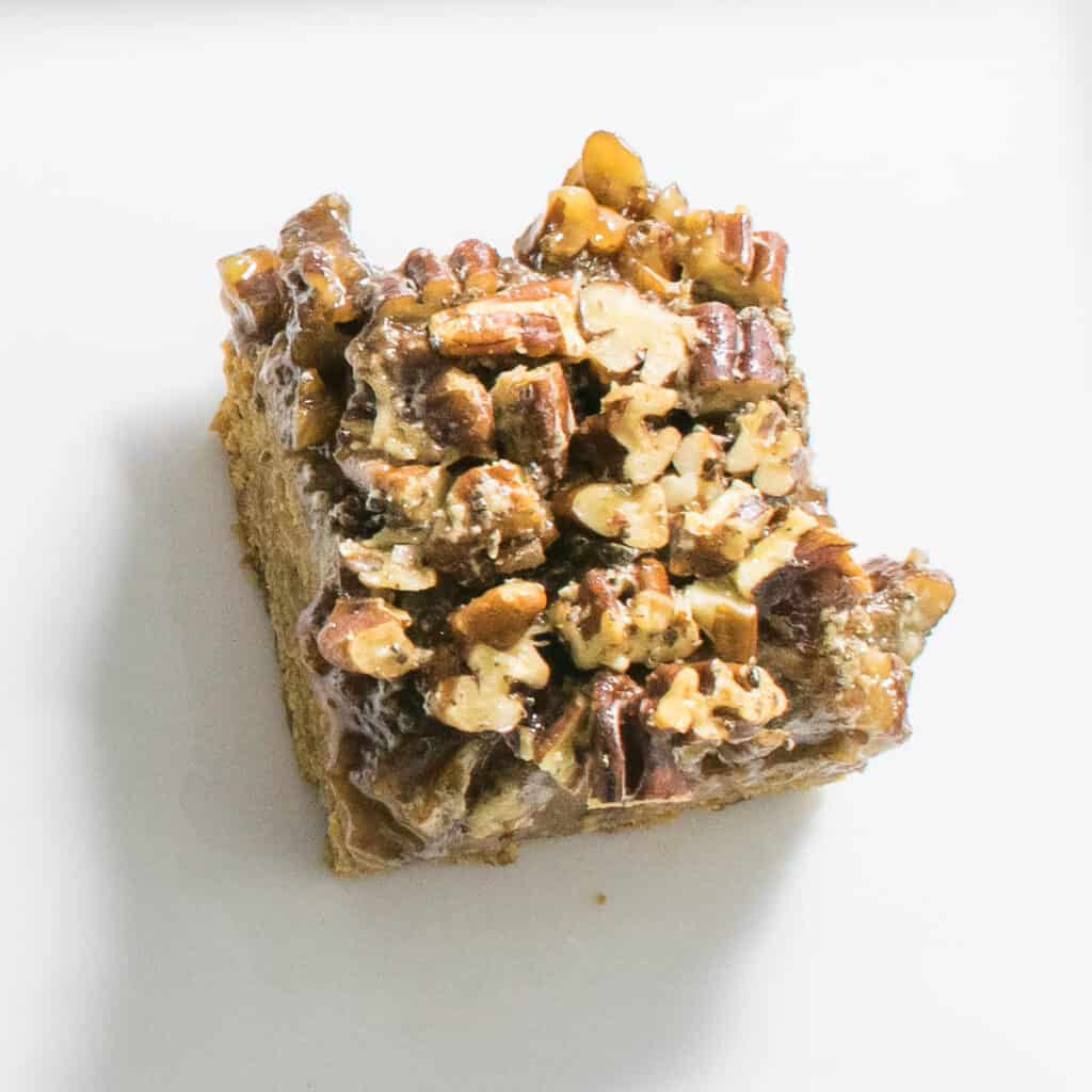 Top view of a square piece of pecan pie bars.