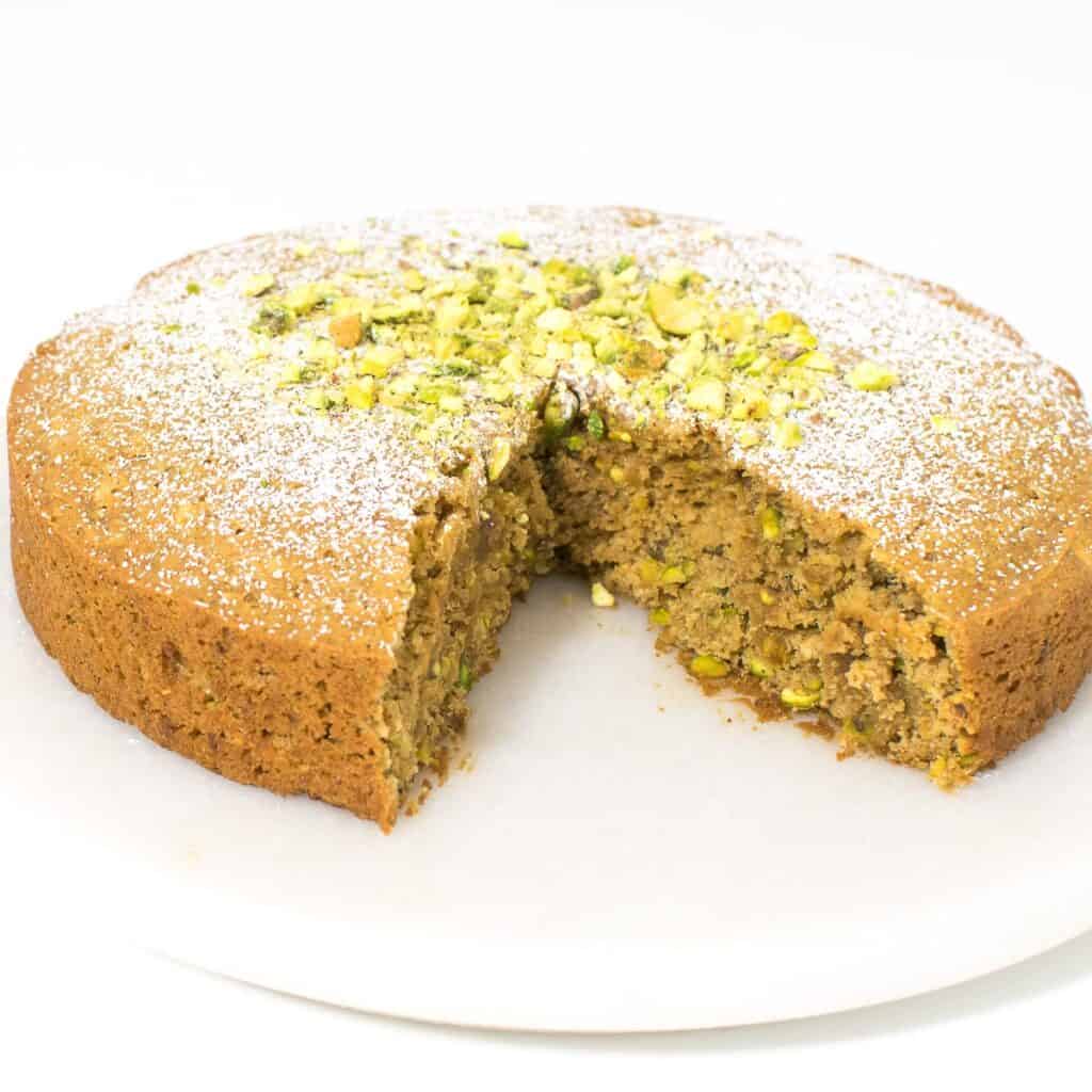 half sliced pistachio cake.