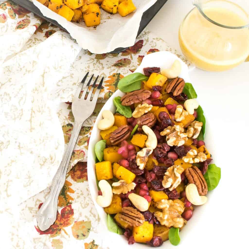 top view of butternut squash salad in a serving plate.