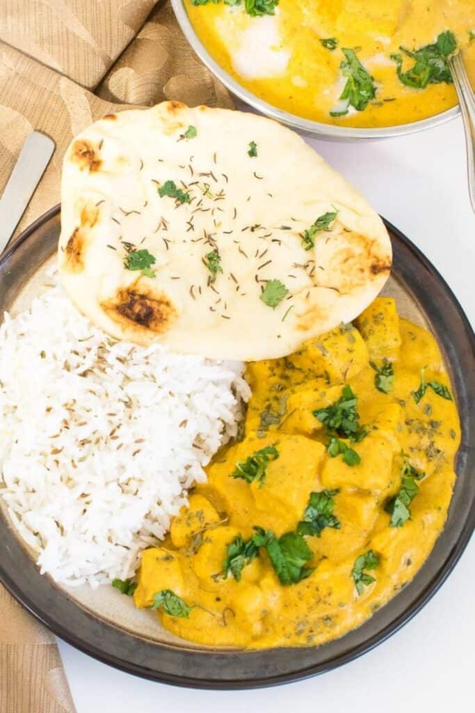 Top close up view of butter tofu being served.