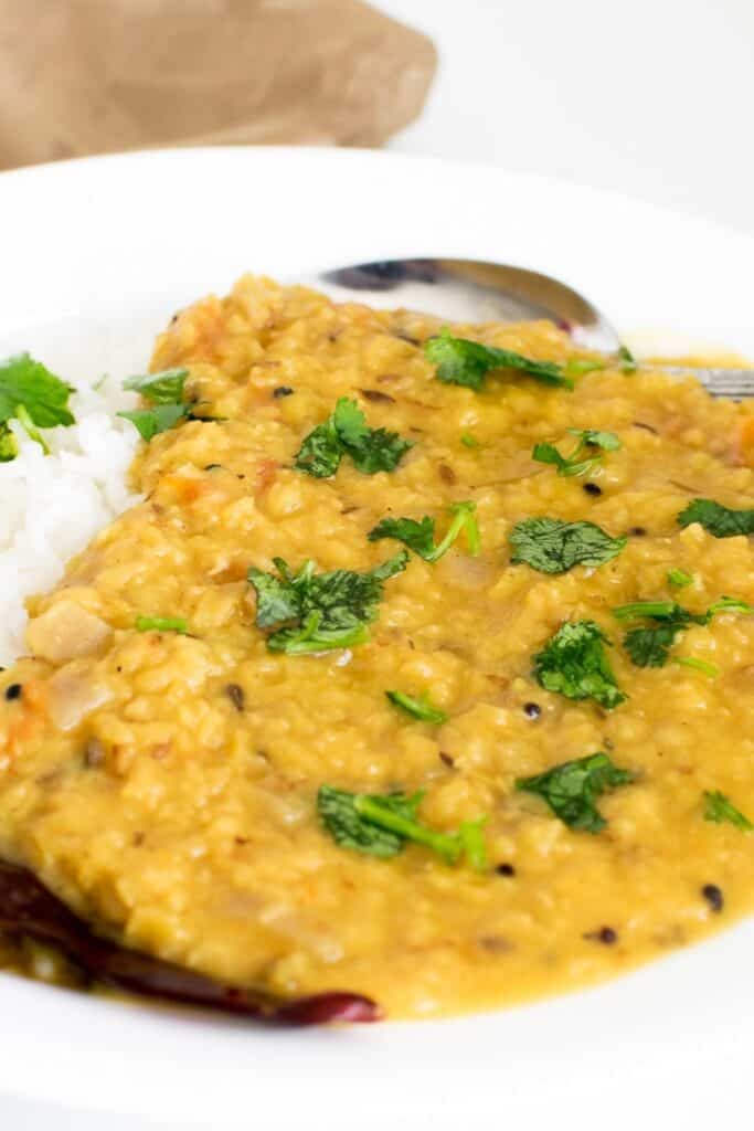 a 30 degree angle view of red lentil dal.