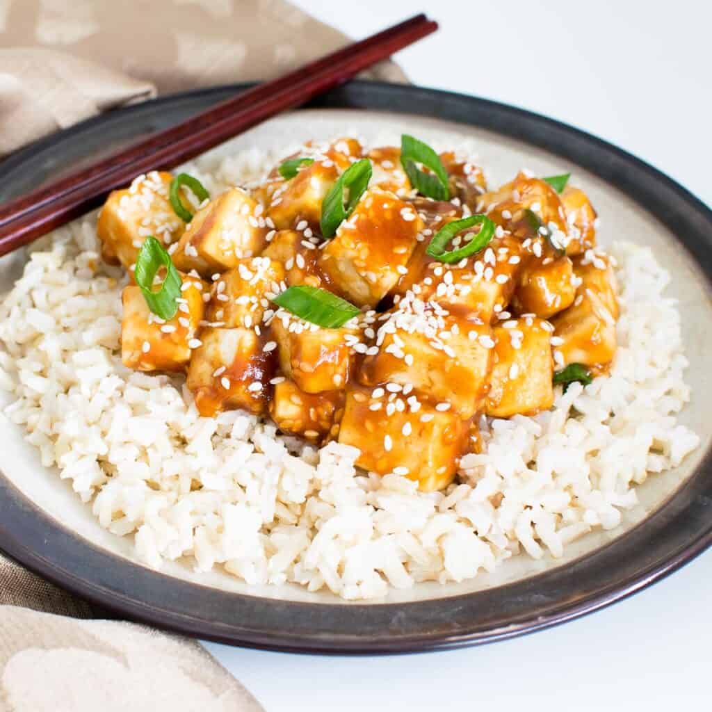 a 45 degree angle view of sesame tofu.