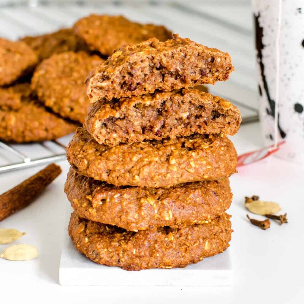 front view of half broken chai cookie on its tall stack.