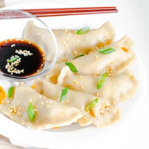 a 45 degree angle view of served vegan dumplings.