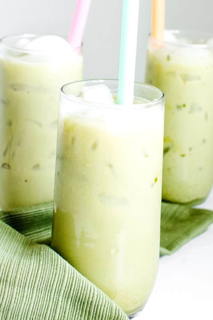tall glasses filled with iced matcha latte.