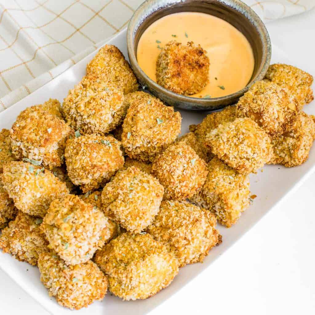 tofu nugget in the dipping sauce.