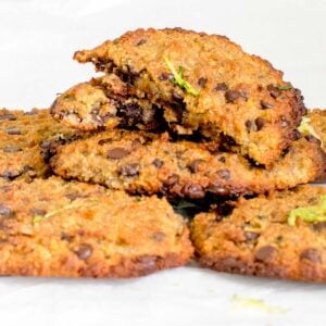 a front view of broken zucchini chocolate chip cookies on its stack.