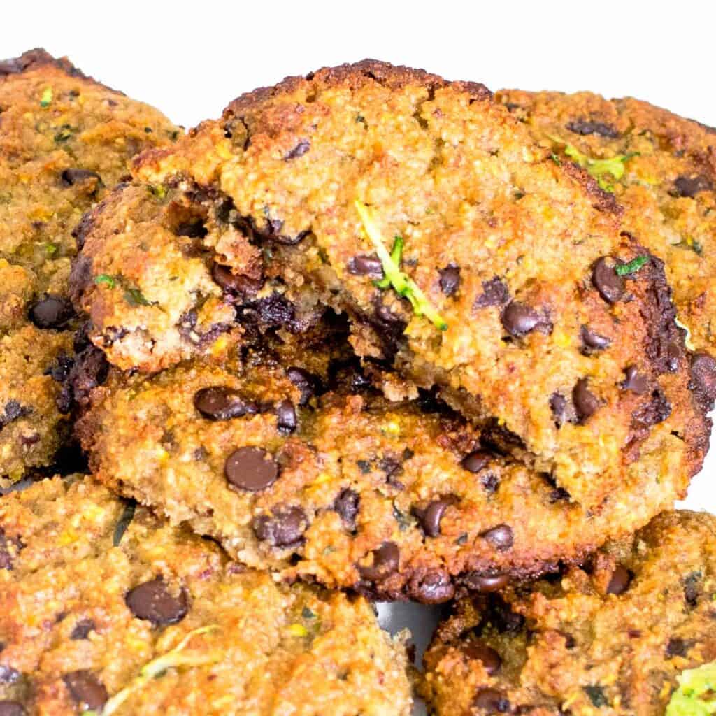 a close up view of halved zucchini chocolate chip cookies.