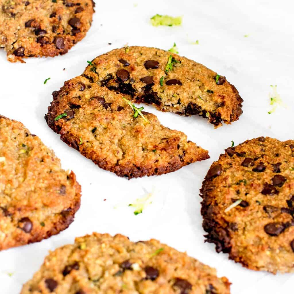 a 45 degree view of a broken zucchini chocolate chip cookies.