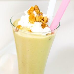 a close up view of avocado milkshake