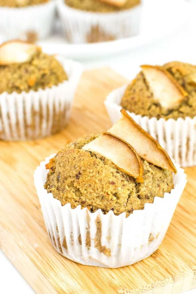 pear muffins on a wooden board.