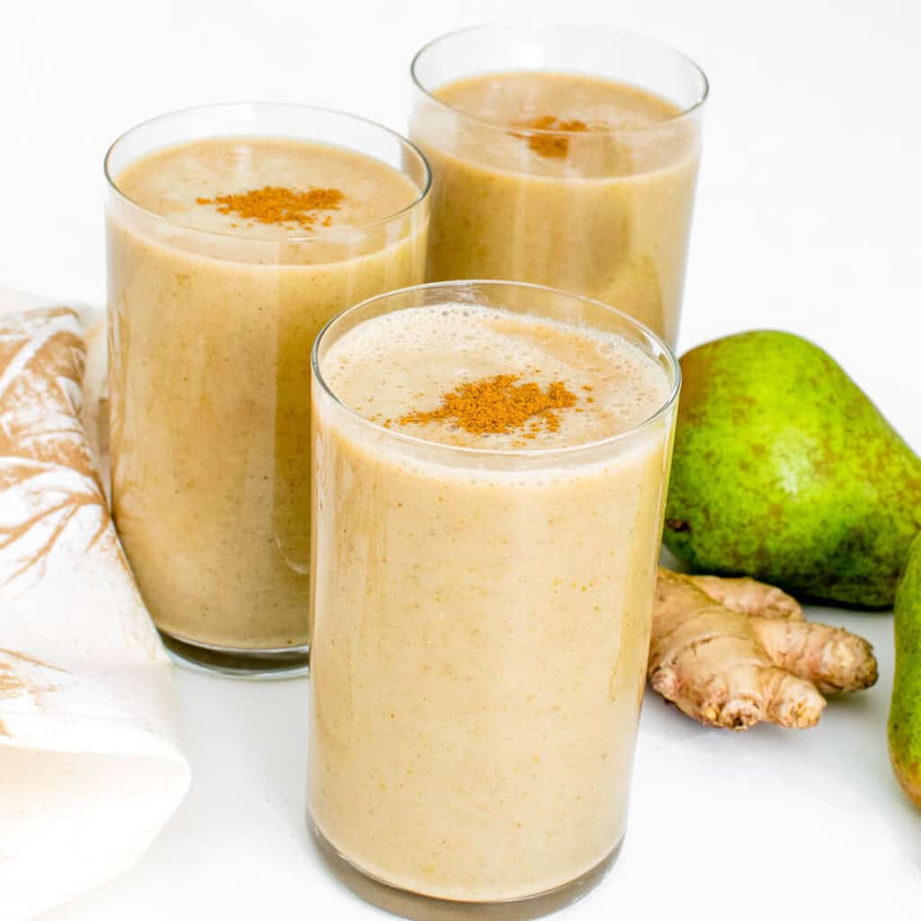 front view of pear smoothie in the serving glasses