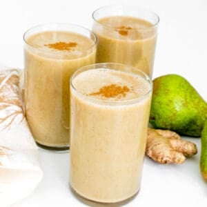 front view of pear smoothie in the serving glasses