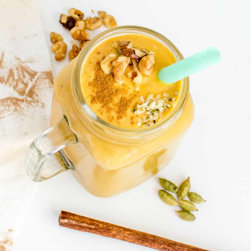 top view of a glass filled with sweet potato smoothie.