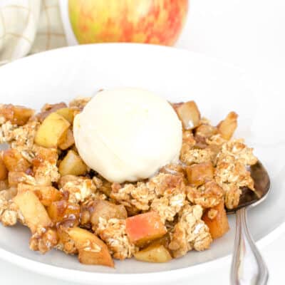 a front view of vegan apple crisp with ice cream