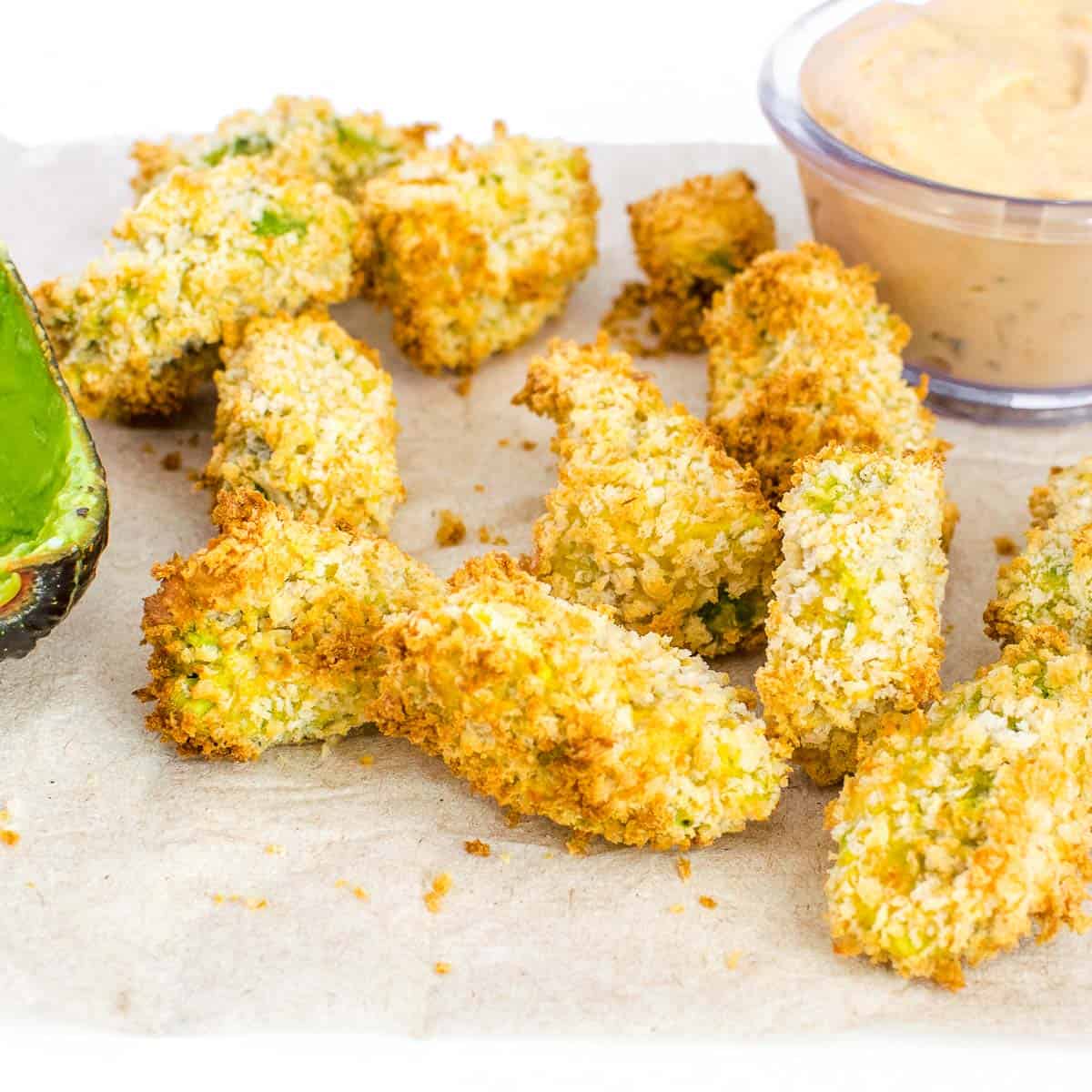 front view of air fryer avocado fries.