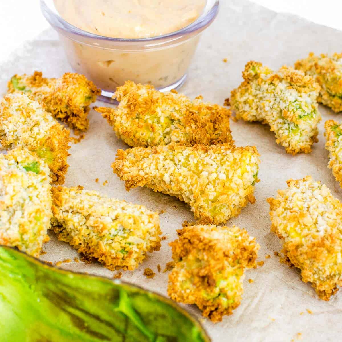 a 45 degree angle view of air fryer avocado fries.