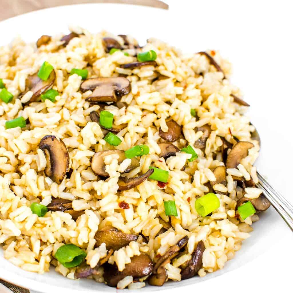 a 45 degree angle view of mushroom fried rice. 