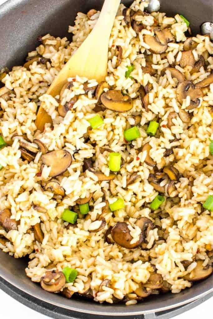 a close up view of mushroom fried rice. 