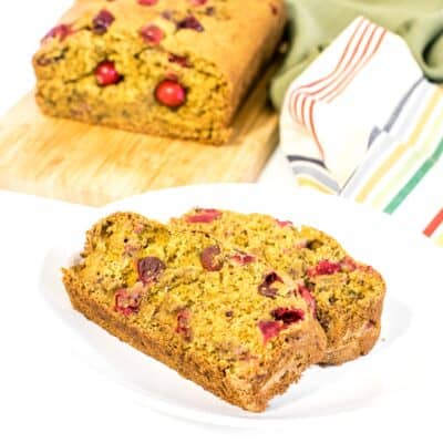 a front view of sliced vegan cranberry orange bread