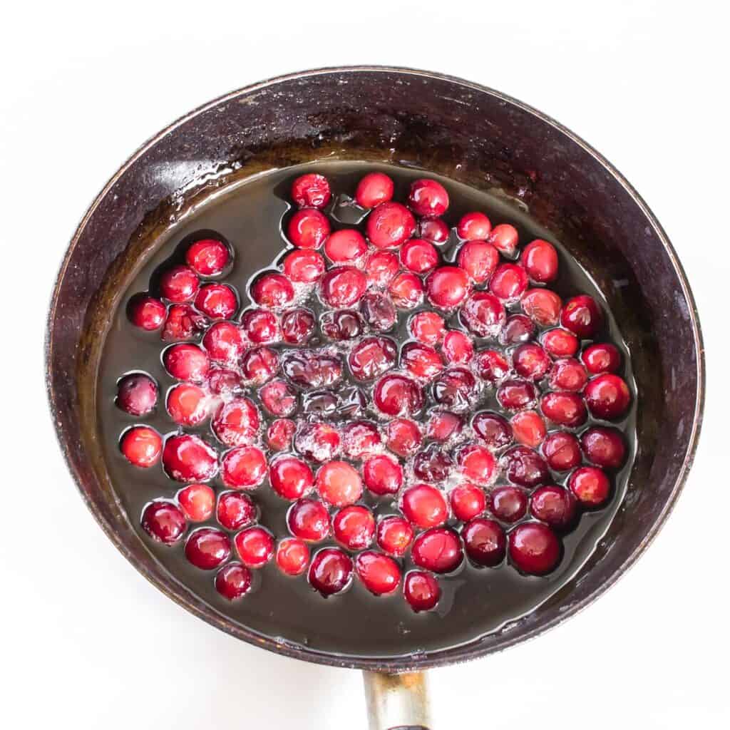 cooked cranberries in a nonstick pan.
