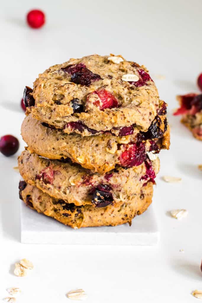 a front view of stacked vegan oatmeal cranberry cookies.